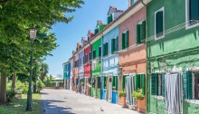 View of a row of colorful houses in Burano