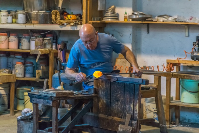 A glass artist at work in Murano