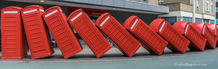 View of fallen red phone boxes