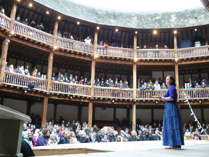 A performer on stage at the Globe Theatre