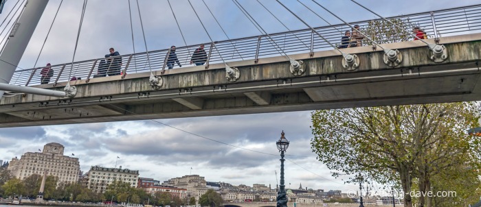 People crossing the Golden Jubilee footbridge