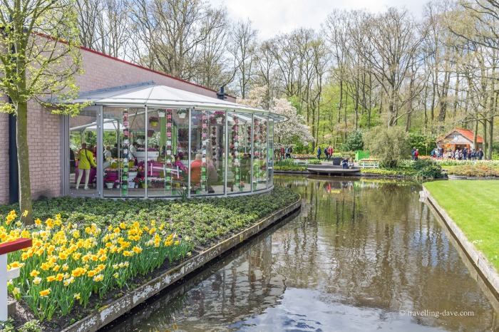People in a pavilion by the canal at Keukenhof