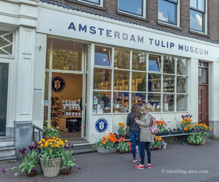 People in front of the Tulip Museum in Amsterdam